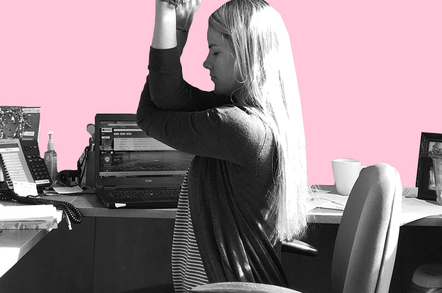 4 Energizing, De-Stressing Stretches To Do At Your Desk Right Now